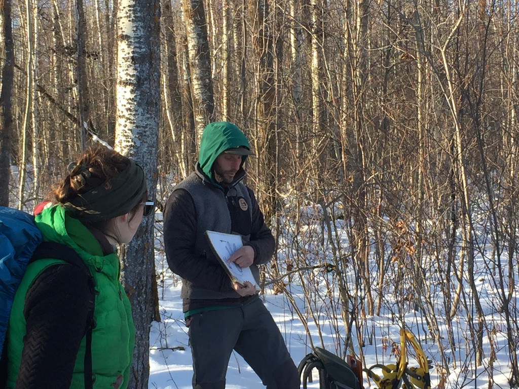 Participants in Alberta's first Wildlife Track & Sign Certification Evaluation. Those that demonstrated sufficient skill were awarded certifications of varying levels. They pose with their certificates.